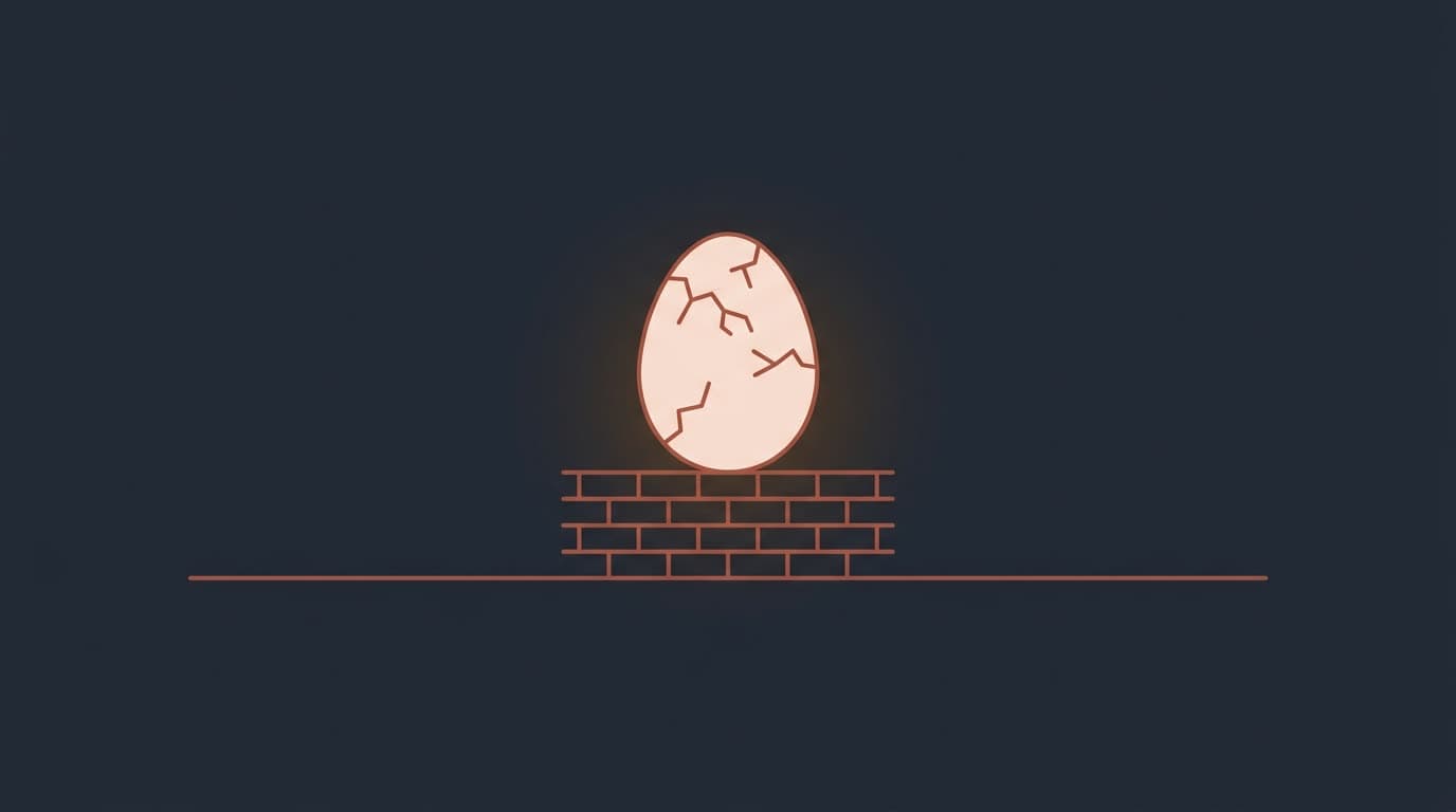 Oxblood cracked oval balanced on a narrow wall, on a deep navy background